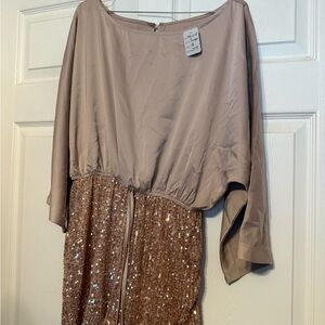 Sequin Romper with Batwing Sleeves tag still attached